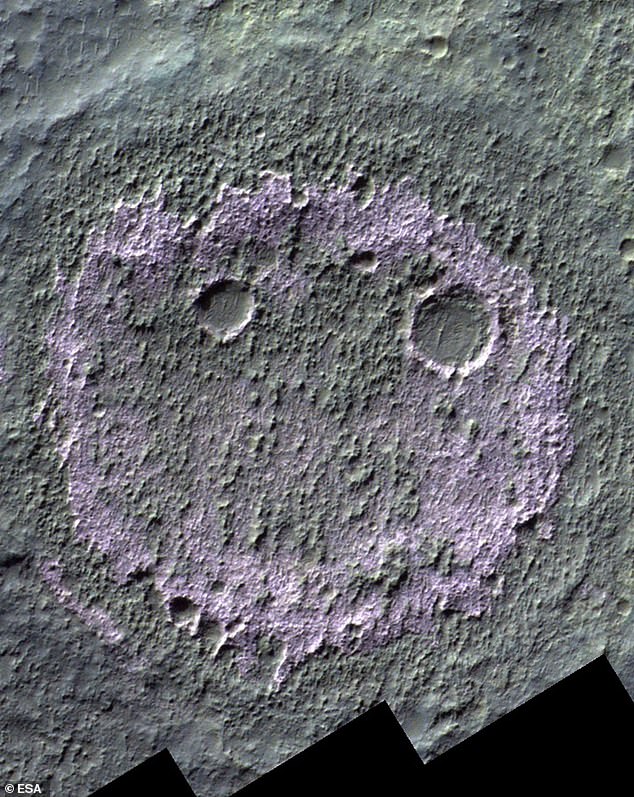 The European Space Agency ESA captured this image of a smiley-face-shaped salt layer on Mars, which may contain evidence of ancient alien life on the Red Planet