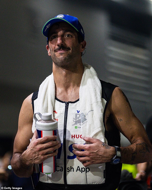 Ricciardo is pictured just after setting the fastest lap of the Singapore Grand Prix in what turned out to be the final race of a great career