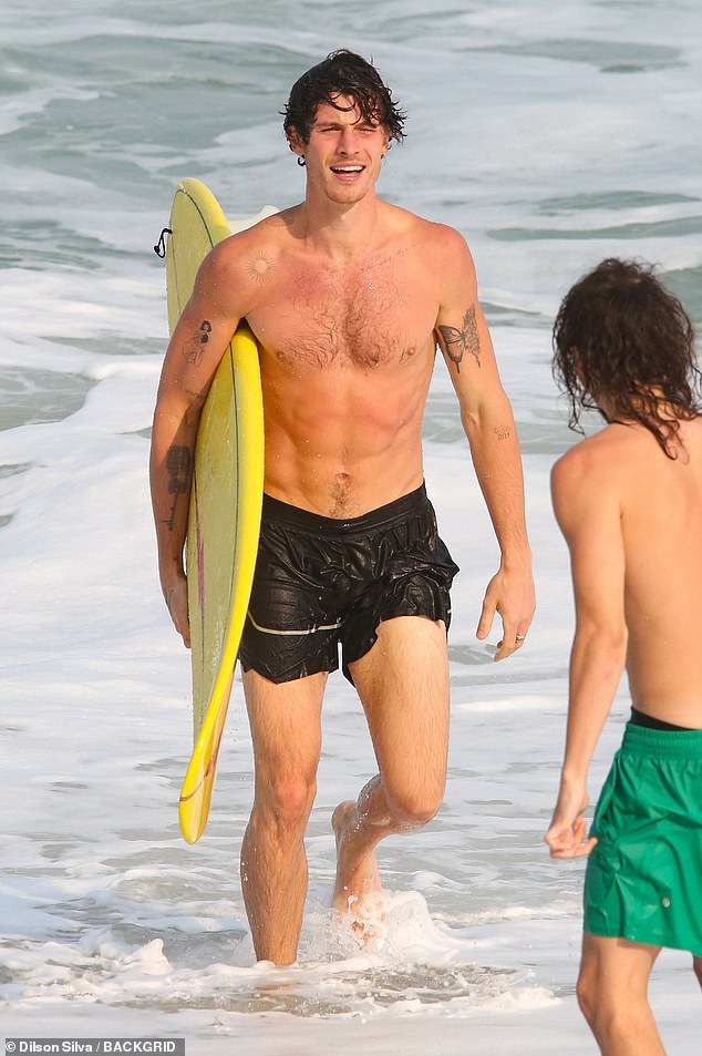 Shawn Mendes caused a stir on Friday when he showed off his muscular body on a beach in Brazil