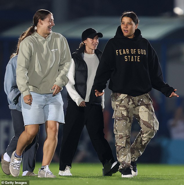 Football superstar Sam Kerr (pictured right at Chelsea's Aston Villa match last week) has confirmed that her torn ACL isn't the only issue keeping her off the pitch