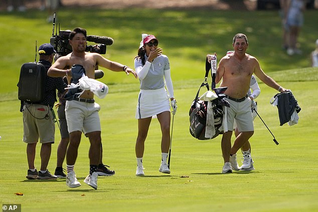 Taylor Takada (left) and Jack Fulghum (right) ripped off their shirts during the Solheim Cup