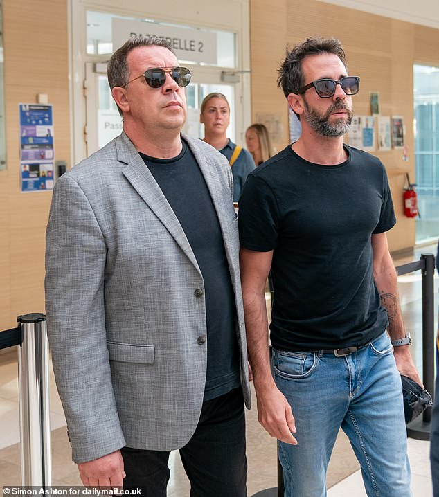 David and Florian Pelicot enter the courtroom on the morning of Monday, September 9