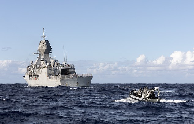 Both HMAS Arunta and HMAS Canberra are en route to rescue the sailors (pictured HMAS Arunta during a training exercise)