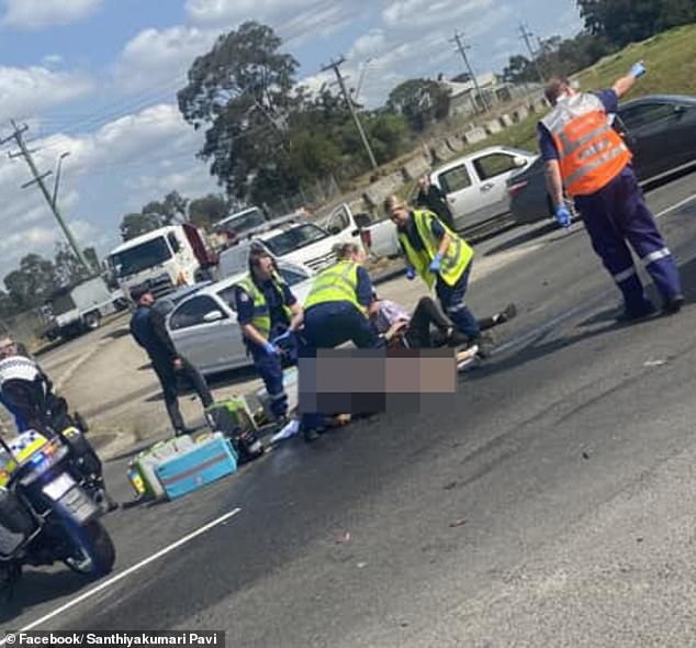 Paramedics were seen treating the motorcyclist after the crash in Prospect on Tuesday