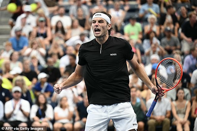 Taylor Fritz reacts after winning his singles round of 16 tennis match against Casper Ruud