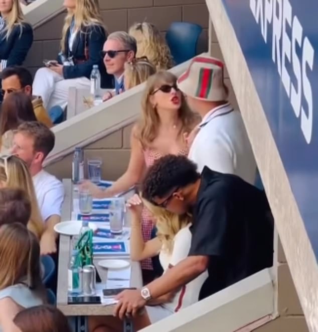 Travis Kelce and Taylor Swift are seen singing 'I Believe in a Thing Called Love' on Sunday