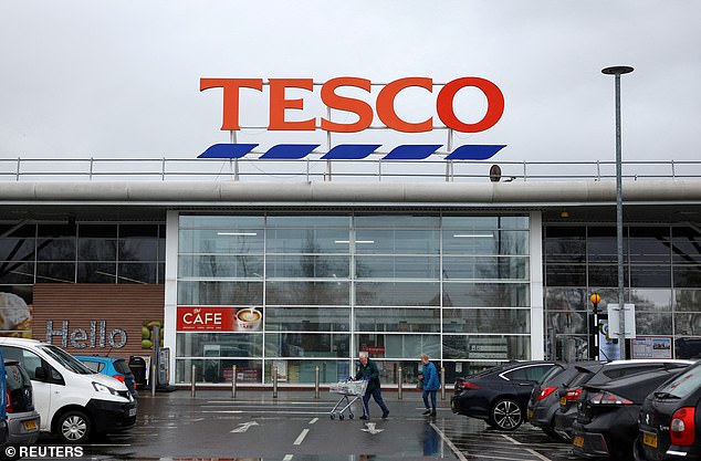 Legal battle: Tesco faced legal action from the Union of Shop, Distributive and Allied Workers (Usdaw) after it tried to fire distribution centre staff and rehire them on lower pay in 2021