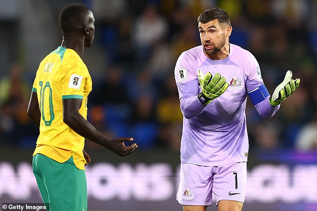 Awer Mabil and captain Mat Ryan have words on the pitch during the disastrous World Cup qualifier against Bahrain