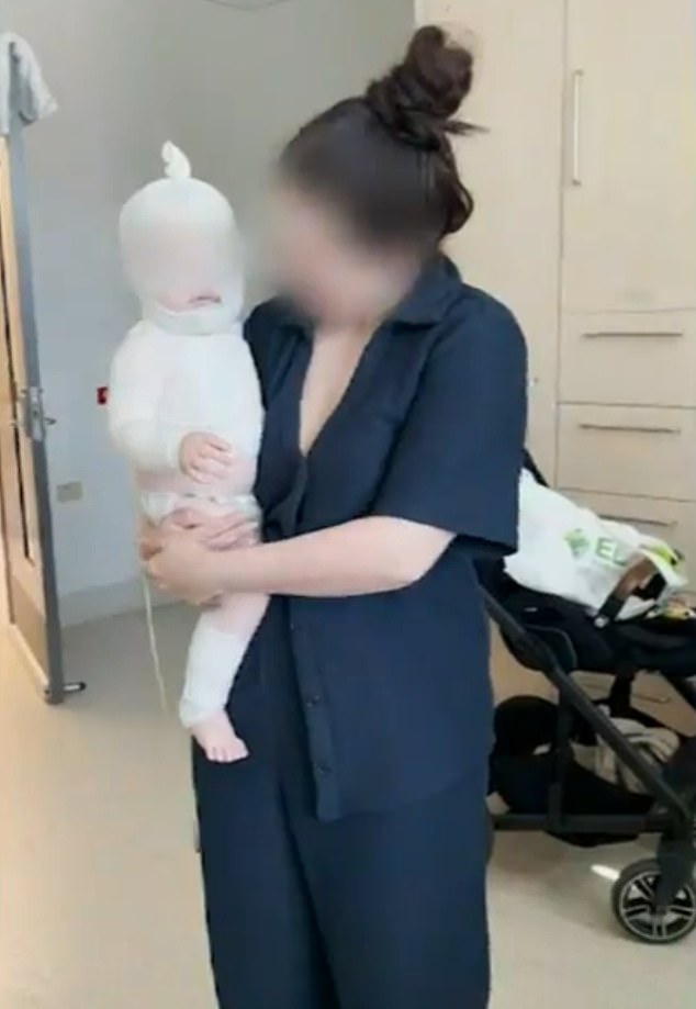 The mother of a baby boy (pictured) who was seriously injured in an attack by a stranger last month has revealed that police refused to share key information with her.