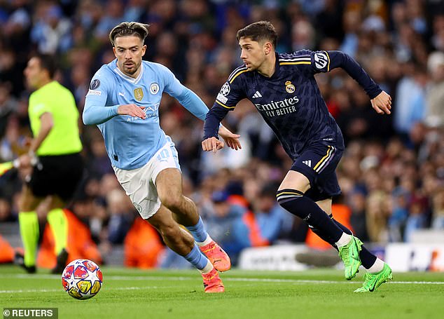 Players using small shin pads is a trend many believe was started by City's Jack Grealish (left)