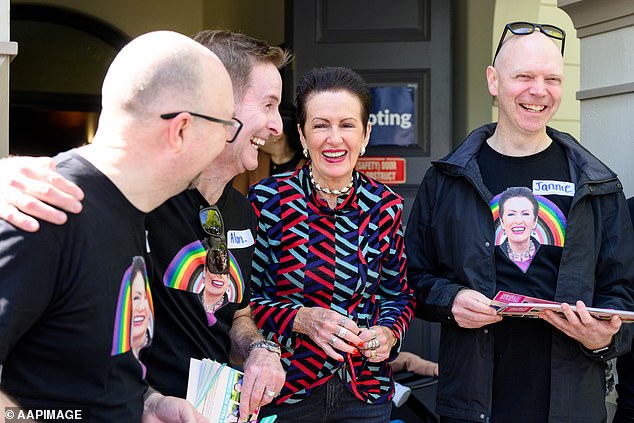 Clover Moore has apologised to a rival councillor candidate after her poster was removed from a polling station in Redfern and replaced with a poster of Ms Moore.