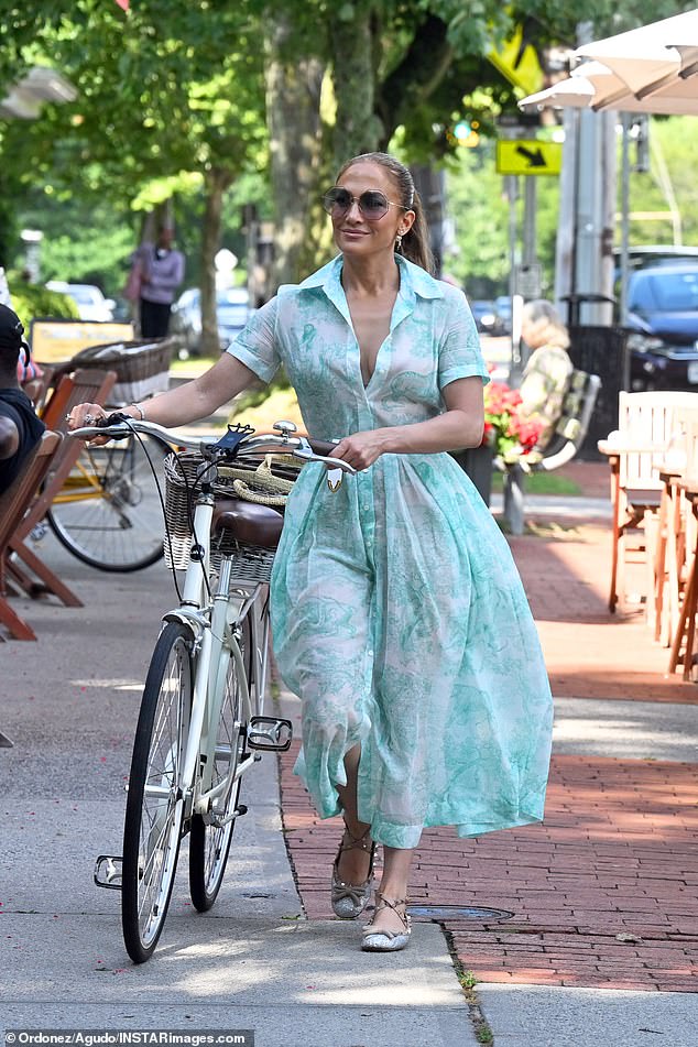 J Lo looks effortlessly glamorous in her Dior shirt dress with strappy ballerina flats