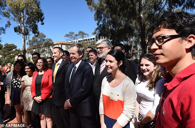 Bill Shorten is pictured with students at the University of Canberra in 2014. He now has a job there