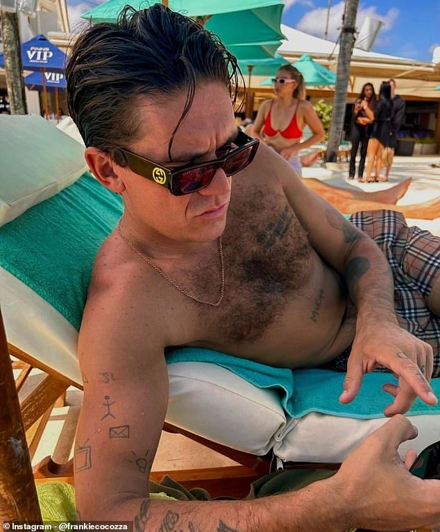 This X Factor star looks exactly like Robbie Williams, 50 - but can you guess who it is?