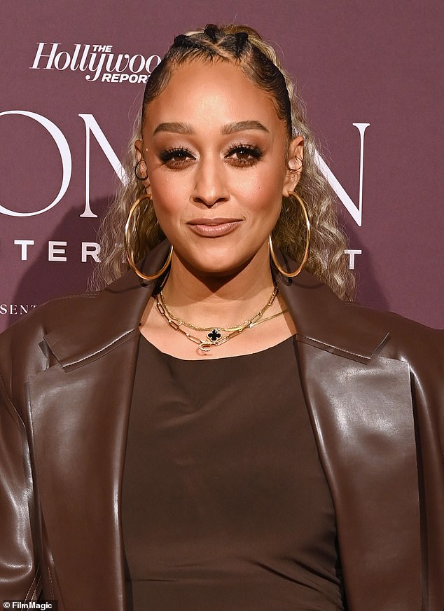 Tia Mowry has revealed that her and her twin sister Tamera Mowry's bond isn't as close as it used to be; photo in December 2023