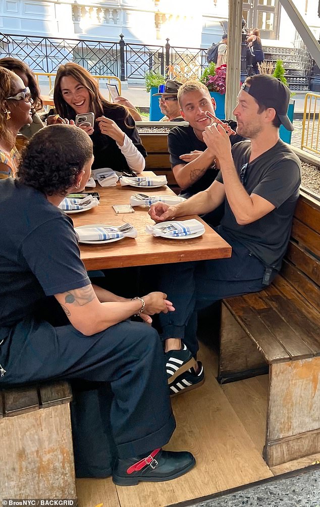 Tobey Maguire, 49, was photographed enjoying lunch in New York City on Thursday with a group that included his best friend Leonardo DiCaprio's girlfriend, Vittoria Ceretti, 26.