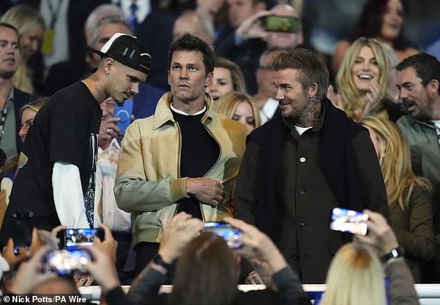 Tom Brady sat with David Beckham and Romeo Beckham during Monday's League One match