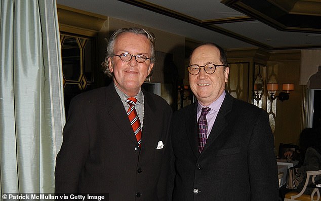 Murder victim Kenneth Savinski (left) is seen with a friend at an event at Bergdorf Goodman's Restaurant "BG" in 2006. Savinski was an antique dealer and decorator