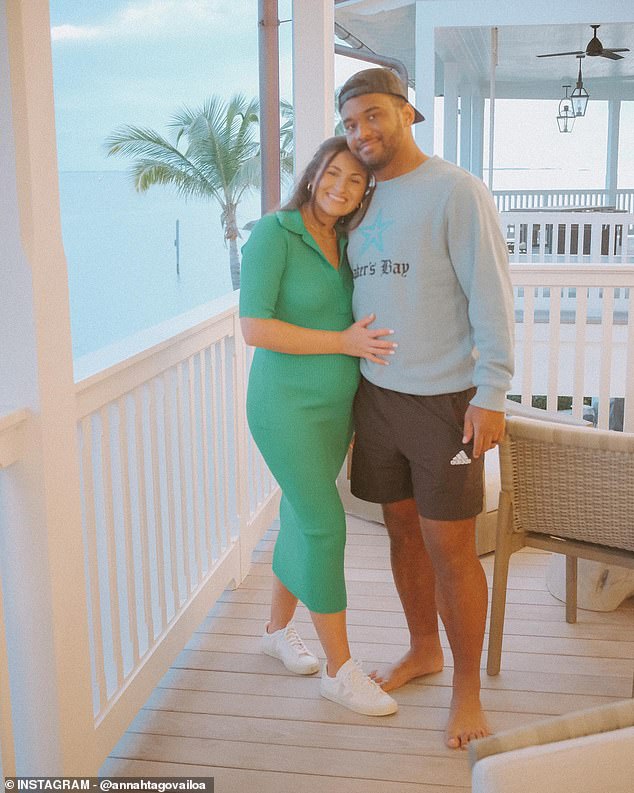 Tagovailoa has been urged to retire for his family. He is pictured with his wife Annah