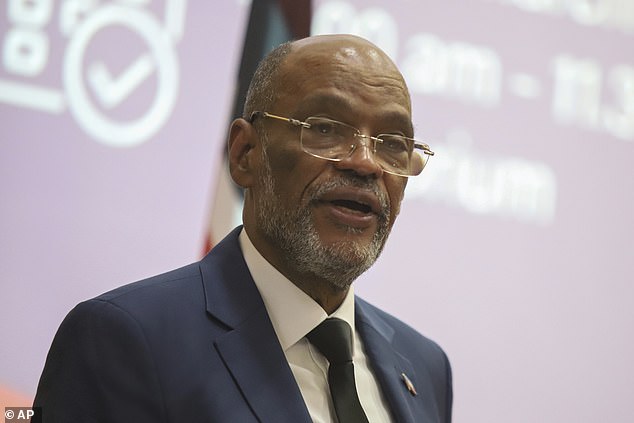 The latest massacre came after Haiti's Prime Minister Ariel Henry flew to Kenya to persuade the African country to expedite its UN-approved donation of 1,000 police officers to restore law and order in Haiti. Pictured: Ariel Henry during a public lecture at the US International University in Nairobi, Kenya on March 1