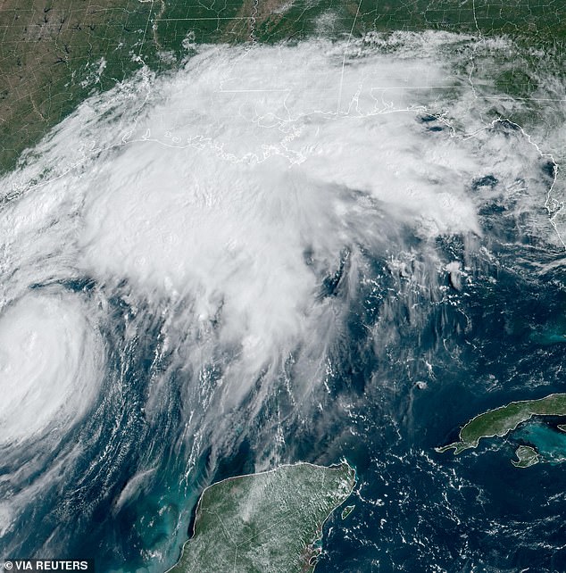 A composite satellite image taken Tuesday shows Tropical Storm Francine strengthening and on track to become a hurricane before it is expected to make landfall on the U.S. Gulf Coast.