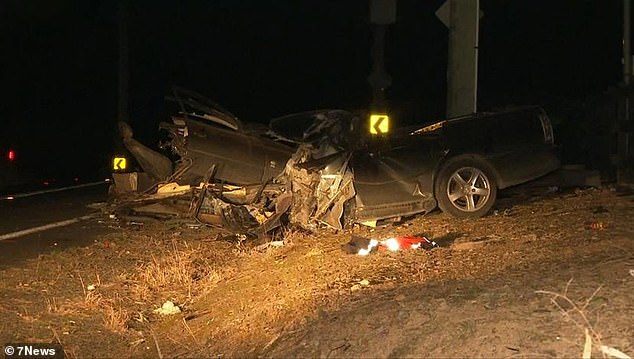 A pickup truck has been split in half after a serious crash 70km west of Sydney (scene pictured)