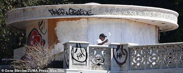 The second house was given a new coat of paint, but was defaced with graffiti again a few days later.