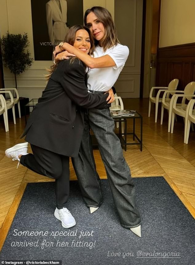 Earlier in the day, Victoria wore the same ensemble as she hugged her longtime friend Eva Longoria in an adorable photo taken during a fitting