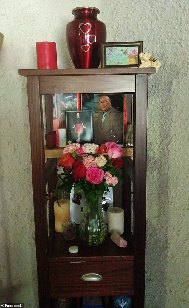 Isabelle's ashes are now in an urn on top of a cupboard in the living room of the family home