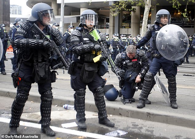 A police officer dies during chaos at protests in Melbourne