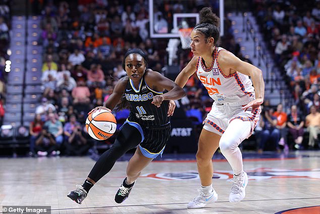 Dana Evans of the Chicago Sky rides Veronica Burton of the Connecticut Sun