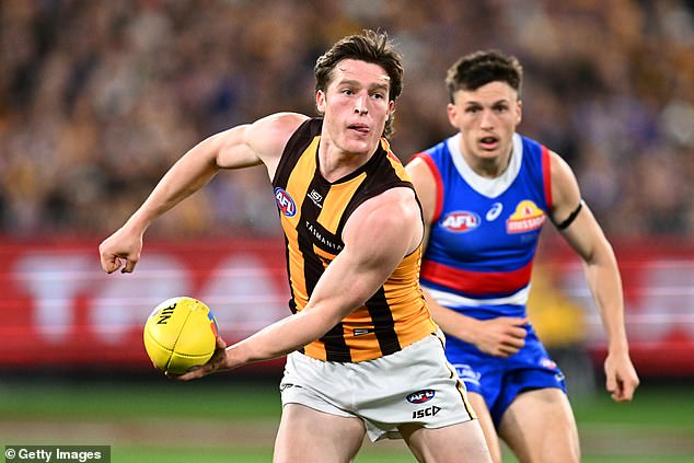 Josh Ward (pictured) broke his nose in a freak accident while celebrating Hawthorn's 37-point win