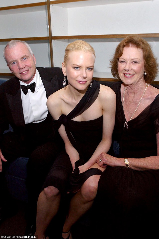 Nicole Kidman, 57, has reportedly been spotted out of the spotlight for three weeks following the death of her mother Janelle. Pictured (L-R) Antony Kidman, Nicole Kidman and Janelle Kidman in 2003