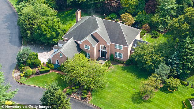 The couple's five-bedroom, $4 home in Manhasset, New York, was searched by the FBI Tuesday morning