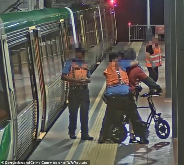 Shocking CCTV footage has been released of a passenger trying to catch the last train home being held in a chokehold and forced to the ground by a transit officer