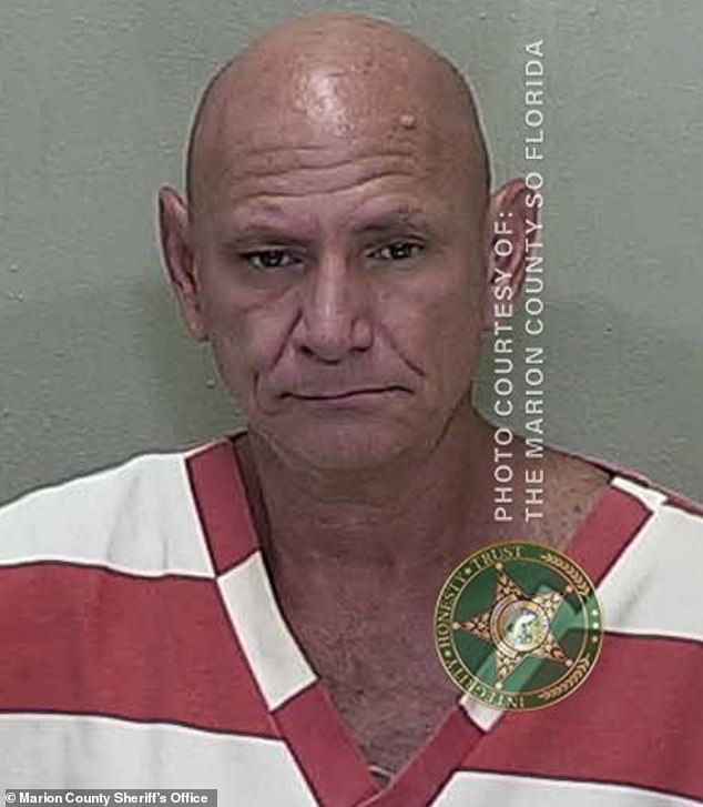 Carl Philip Lombardo, 58, has been arrested for allegedly abusing children and offering their parents $5,000 each to buy them