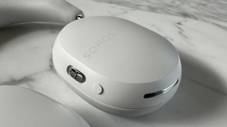 Close-up view of the Sonos Ace headphones Content key