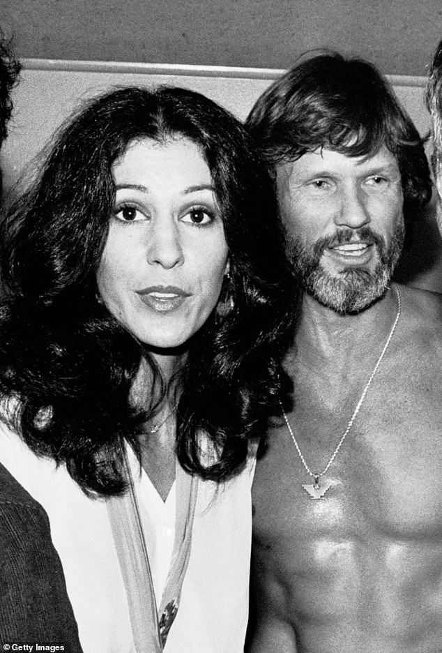 Coolidge said in her memoir that Kristofferson's cheating and drinking took a toll on their marriage. Pictured towards the end of their wedding in 1979 in New York