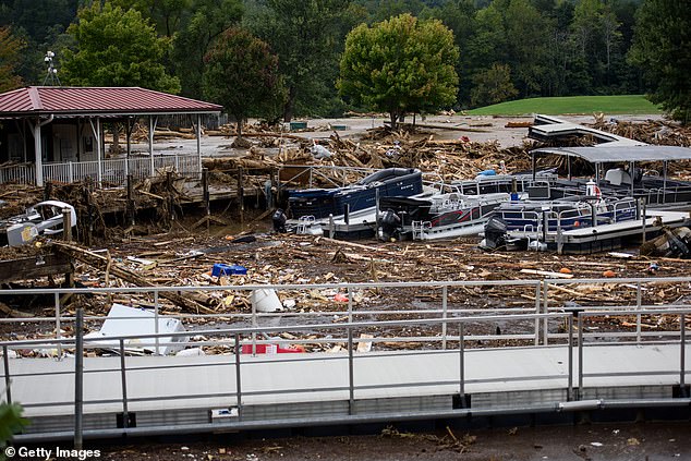 The Rocky Broad River flows into Lake Lure and floods Chimney Rock, North Carolina after heavy rainfall from Hurricane Helene