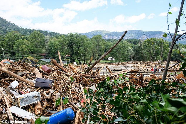 A wall of water rushed down the Broad River, destroying most of the structures along Main Street in Chimney Rock