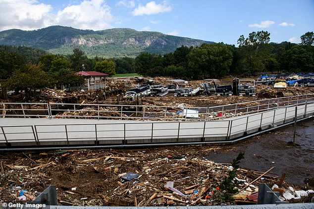 The remains of wooden buildings now look like toothpicks among the rubble