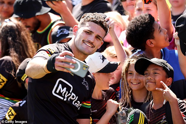 Cleary appeared unaffected by his shoulder problems as he took selfies with fans during training ahead of the NRL grand final