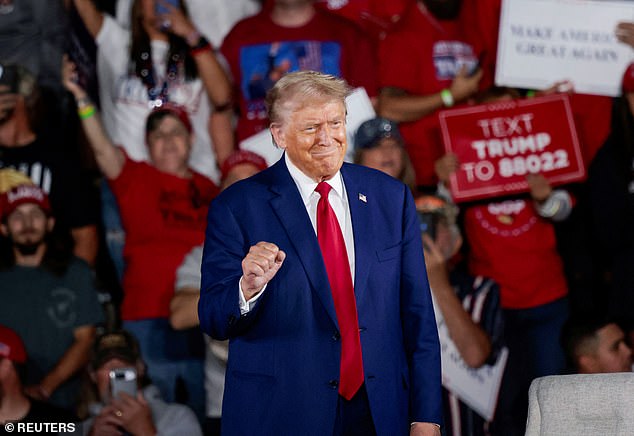 Valleau grabbed a knife and attacked the mailman. But she quickly fended off the attack by pulling out her Postal Service-issued pepper spray, Law & Crime reported. IMAGE: Trump during a campaign town hall event at Macomb Community College in Warren, Michigan, September 27