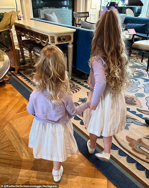 The couple's girls recently started school and their mother shared an adorable photo of the two of them ready for school