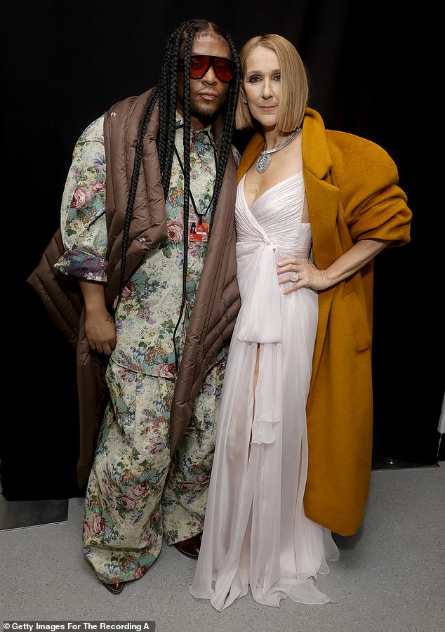 Roach with Celine Dion at the Grammys earlier this year. In his new book, he talks about supporting his two younger brothers after his mother died