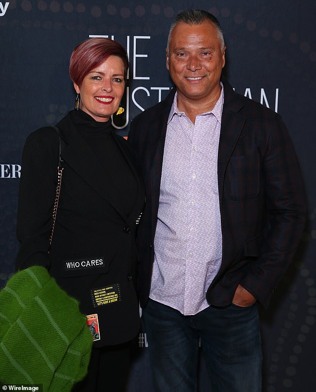 Stan Grant (pictured with wife Tracy Holmes) sensationally quit as host of ABC show Q+A last year after claiming the national broadcaster failed to support him when he was the victim of racist attacks online