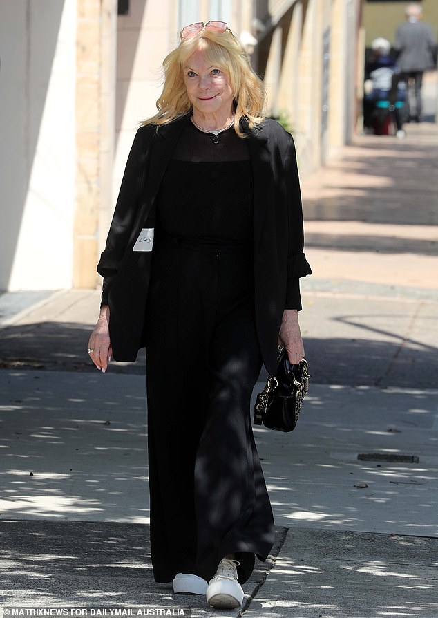 Rocks gallery owner and socialite Christa Billich arrives at the funeral