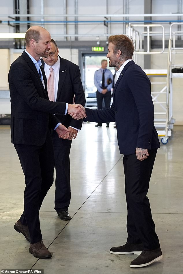 The Prince of Wales and David Beckham shook hands as they arrived together at the Northolt base