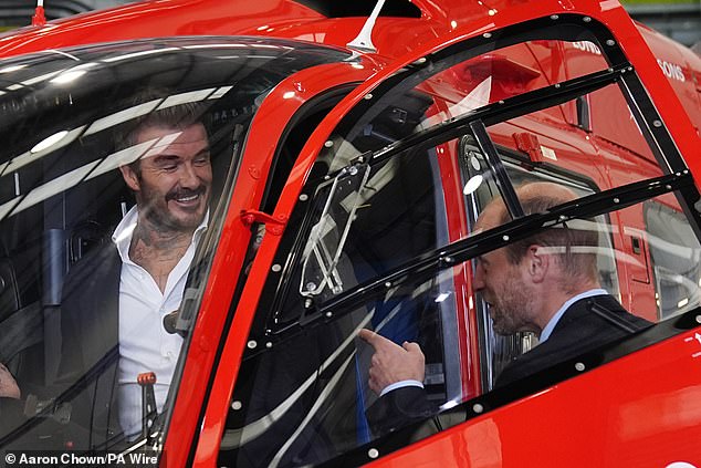 William and Beckham appeared to share a joke as the former footballer stepped into the cockpit