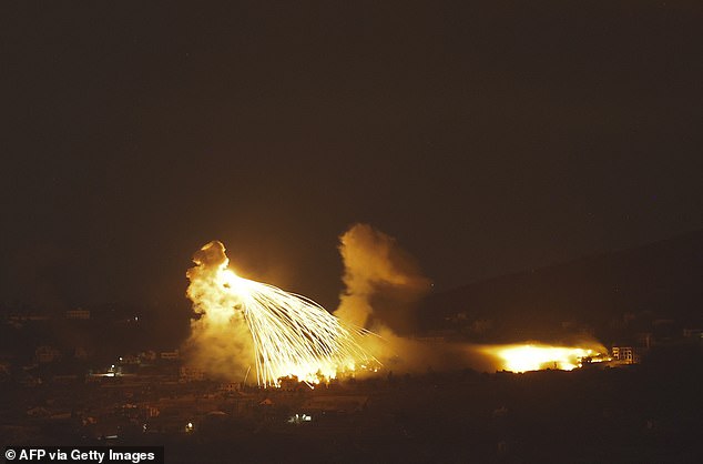 A photo taken from northern Israel, along the border with southern Lebanon, on September 30, 2024 shows a fire following an Israeli bombardment of an area in southern Lebanon